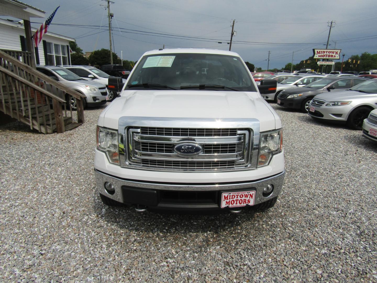 2014 White /Tan Ford F-150 FX4 SuperCrew 5.5-ft. Bed 4WD (1FTFW1ET1EF) with an 3.5L V6 TURBO engine, Automatic transmission, located at 15016 S Hwy 231, Midland City, AL, 36350, (334) 983-3001, 31.306210, -85.495277 - Photo#1